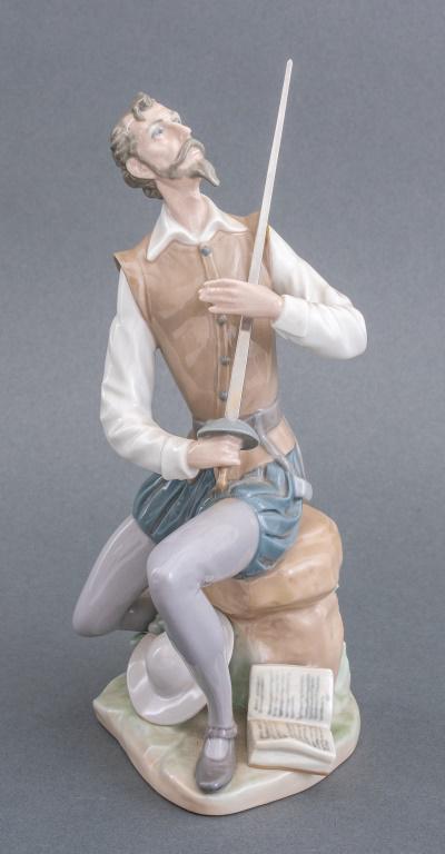 Lladro "Oration" Dom Quixote Porcelain Figurine: Lladro "Oration" glazed porcelain figurine sculpture depicting Dom Quixote, marks to bellow. 9" H x 6" W x 3.5" D.