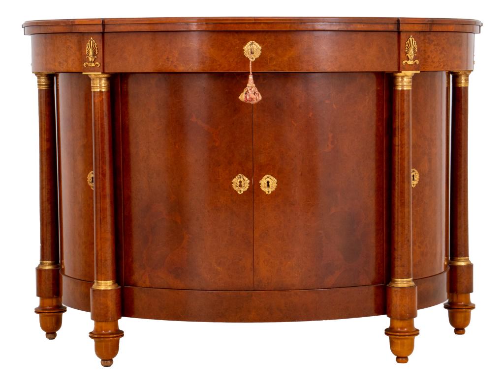 Italian Empire Style Demilune Cabinet, 20th c: Italian Empire style demilune cabinet, 20th c., the semicircular d-form top in burlwood veneer above four giltmetal acanthus-mounted cabinet doors, the central pair between colonnettes, all opening to