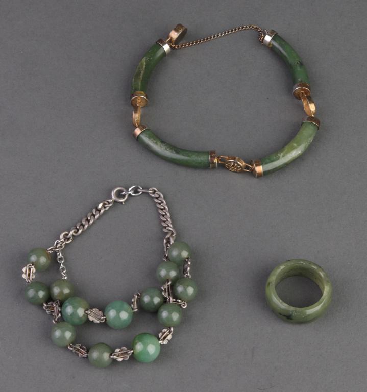 Jade Beaded Bracelets & Ring, 3: Assortment of jade jewelry, including one jade ring and two jade bead and silver-tone link bracelets. Ring size: 8.5. Bracelets: 7" L.