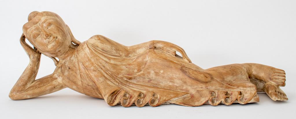 Indonesian Figure of a Reclining Buddah: Indonesian cerused wooden figure of a reclining Buddah, 10" H x 31" L