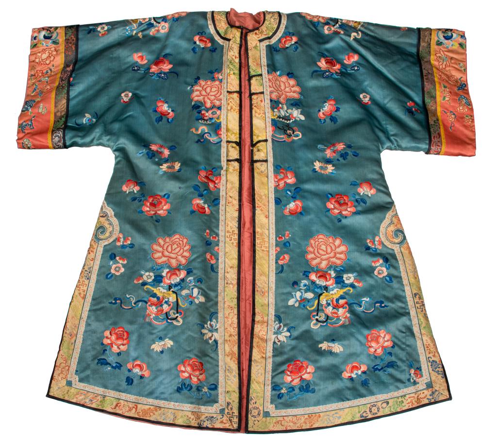 Chinese Embroidered Silk Robe: Chinese silk robe embroidered with polychrome flowers, fruit, and si bats on a blue ground, metal buttons with floral decoration, salmon pink lining, early 20th century or earlier. 44.5" H x 47" W.