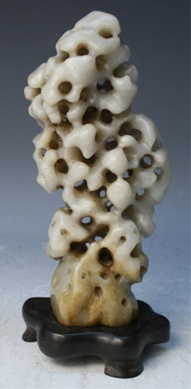 Chinese Jade Mountain Carving w/ Stand Qing Dyn.: Mountain carving with grey and brown coloring, jade with wood stand, China, Qing Dynasty (1644-1911); unmarked. Dimensions: jade approximately 9"H x 4"W x 2-1/2"D; with stand 10"H x 4-3/4"W x 3-1/2"D