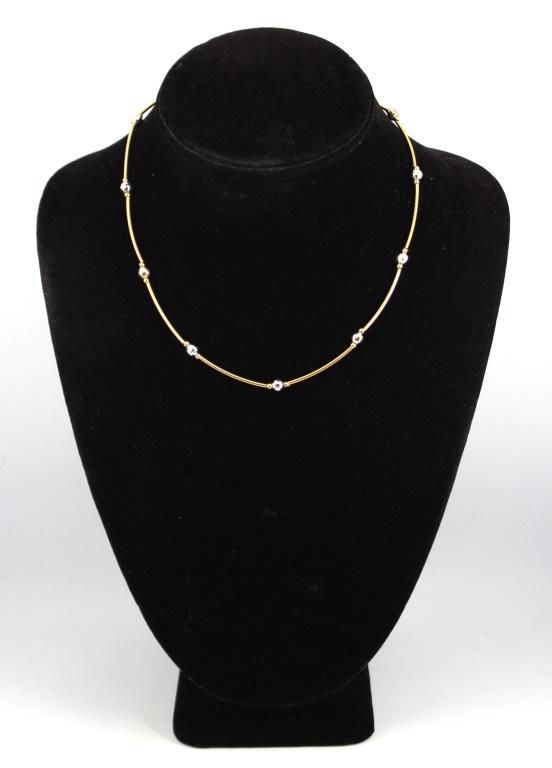 Jacmel Mauritius 14K Yellow & White Gold Choker: Modern Jacmel Mauritius designer 14K yellow and white gold beaded adjustable length choker necklace with spring ring clasp, marked "JCM / 14K," composed of long yellow gold barrel segments and white g
