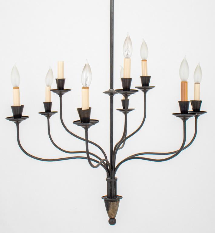 Wrought Iron Nine-Arm Chandelier: Wrought iron chandelier with nine lights. 42" H x 29" Diameter.