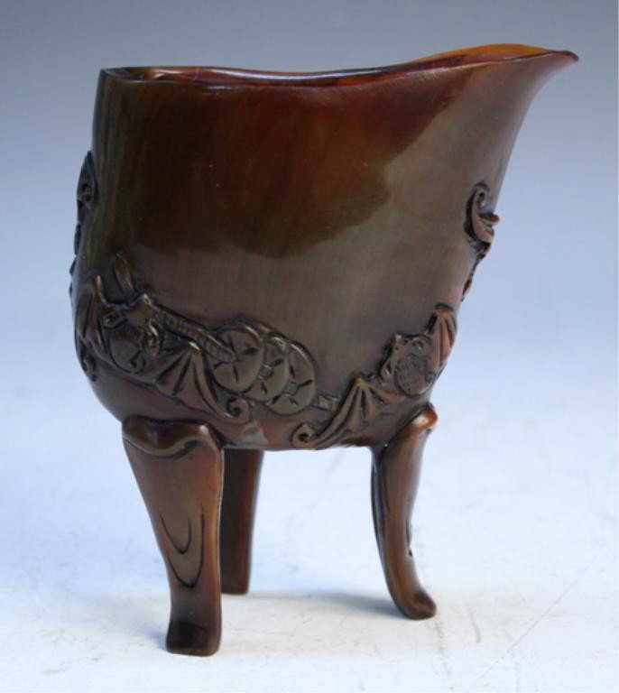 Chinese Carved Horn Cup w/ Bats and Fruit: Carved tripod horn cup with bats and fruit, China; unmarked. Dimensions: 5-1/2"L x 4-1/2" W