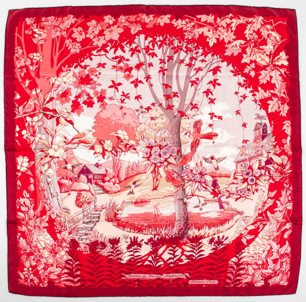 Hermes "Jardins de Nouvelle Angleterre" Silk Scarf: Hermes square silk twill scarf in the "Les Jardins de Nouvelle Angleterre" pattern, decorated with an idyllic lakeside landscape in red hues, "MADE IN FRANCE SOIE 100% SILK" label to reverse. 35" L x