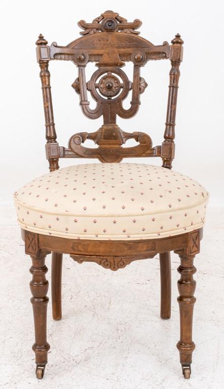 Herter Brothers Style Carved Walnut Side Chair: Herter Brothers style Victorian richly carved walnut side chair, raised on turned tapered leg on caster to front, upholstered seat, circa late nineteenth century. 36.5" H x 19.5" W x 18.5" D; seated: