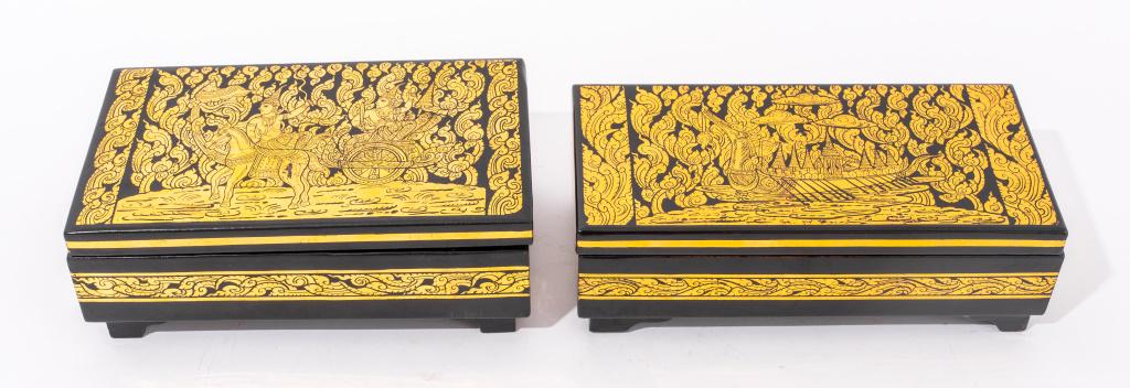 Thai Black & Gold Lacquered Decorative Boxes, 2: Two Thai black and gold lacquered wooden decorative boxes, unmarked. 3" H x 7.5" W x 4.5" D.