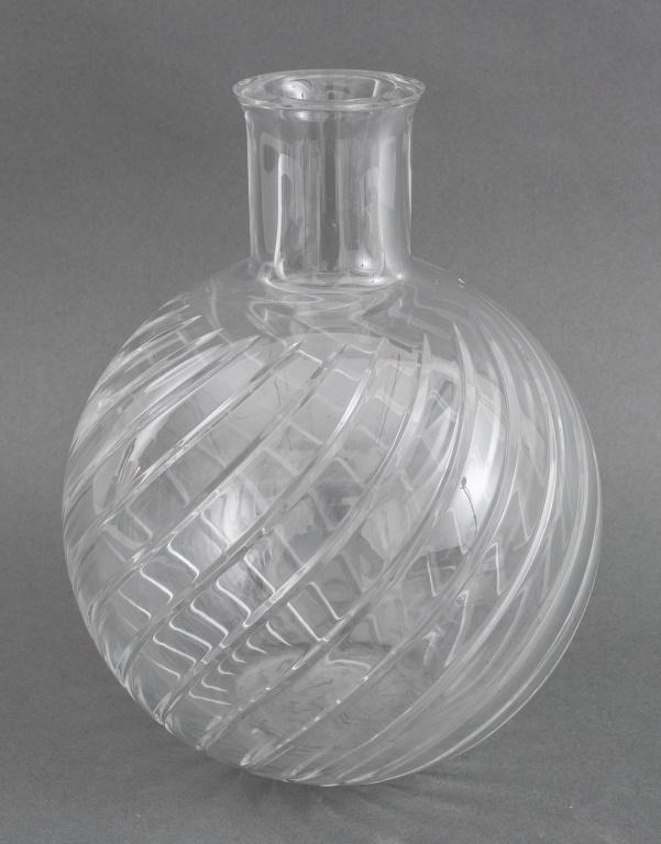 Baccarat French Crystal Glass Vase: Baccarat French crystal glass vase, marked "Baccarat / France." 9.25" H x 7" in diameter. One flea bite chip on the mouth of the vase.
