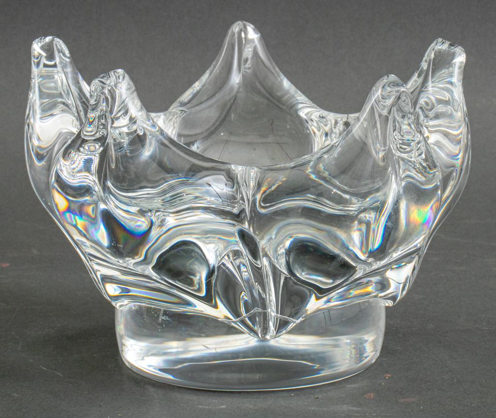 Goran Warff for Kosta Boda Crystal Centerpiece: Goran Warff (Swedish, 1933-2022) for Kosta Boda floriform crystal glass center bowl, signed to base, circa late twentieth century. 5.75" H x 7.5" Diameter.