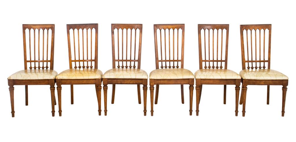 Beech Wood Dining Chairs, 6: Beech wood dining chairs, six, with straight crest rails and arcade spindle backs, above an upholstered seat on turned tapering columnar legs. 38" H x 20" W x 17" D x 18" seat height.