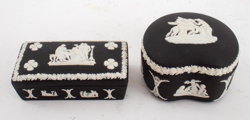 Wedgwood Black Jasperware Decorative Boxes, 2: Two Wedgwood black jasperware diminutive decorative boxes, made in England, stamped "Wedgwood / Made in England." 1.75" H x 3" W x 2.5" D.