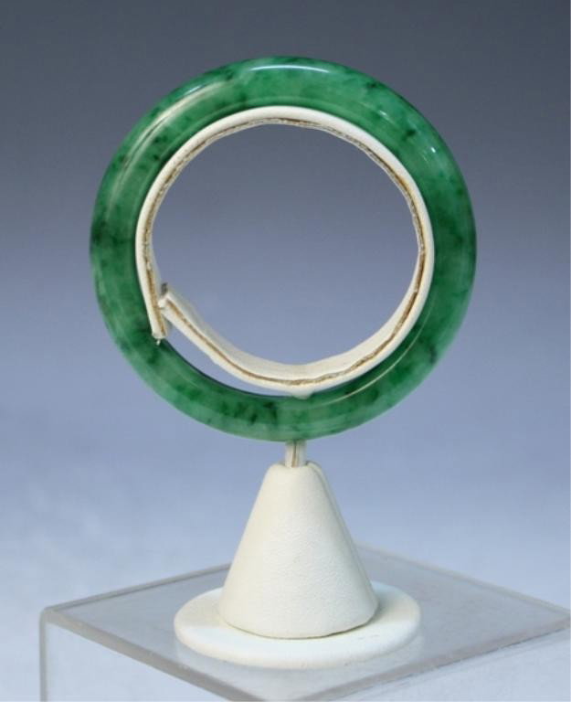 Chinese Jade Bangle: Jade bangle, China; unmarked. Dimensions: 2-3/4" Diameter