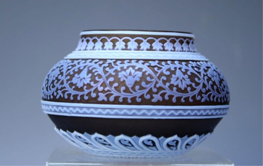 Cameo Glass Miniature Vase circa 1890 attr. Webb: Miniature cameo glass vase brown with iridescent blue and white etchings in a Moreschi/Islamic design, attributed to Thomas Webb, 1890s; unmarked. Dimensions: 2-1/4" H x 3" W x 3-1/4" D