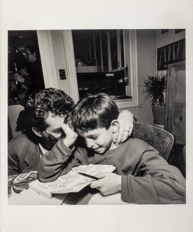 Lee Friedlander "Tom & Giancarlo" Photograph, 1999: Lee Friedlander (American, b. 1934) "Tom and Giancarlo," 1999, gelatin silver print photograph of a man and boy indoors, titled, dated, and inscribed "For Francesca / Happy Easter / Lee" to verso. 20"