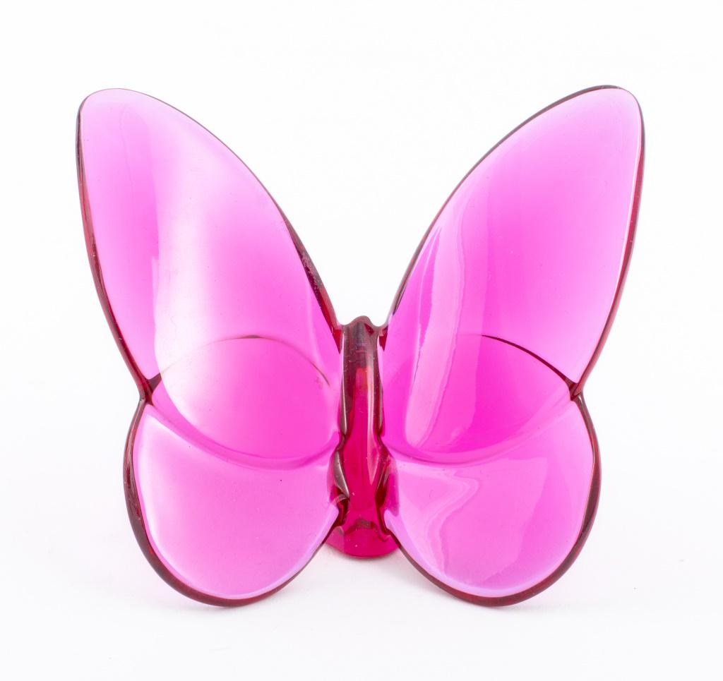 Baccarat Peony Pink Crystal Lucky Butterfly: Baccarat French crystal "Lucky Butterfly" sculpture in peony pink, signed "Baccarat" and marked "BACCARAT FRANCE" to underside. 2.75" H x 2.5" W x 2" D.