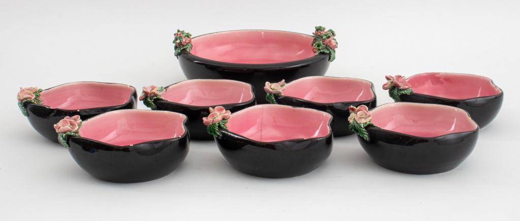 Bonwit Teller French Majolica Dessert Service, 8: French Majolica dessert service for Bonwitt Teller & Co having pink ground and black outside with fruit and flower 3D motifs, comprising (1) serving plate and (7) seven bowls, each marked "Bonwitt Tel