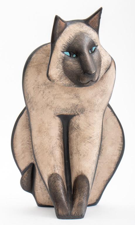 Linda Pleet Cat Resin Sculpture, ca 1989: Linda Pleet (American, XX-XXI) hand painted carved resin sculpture depicting a seated Siamese cat with blue eyes, signed "Pleet" to rear bottom, circa 1989. 15.5" H x 9.5" W x 7" D.