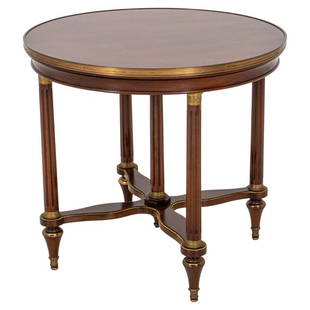 Louis XVI Style Ormolu Mounted Bouillotte Table: Louis XVI Style ormolu-mounted mahogany bouillotte table, in the manner of Adam Weisweiler (French, 1750-1820) circular with giltmetal moldings on four fluted columnar legs with gilt capitals and one