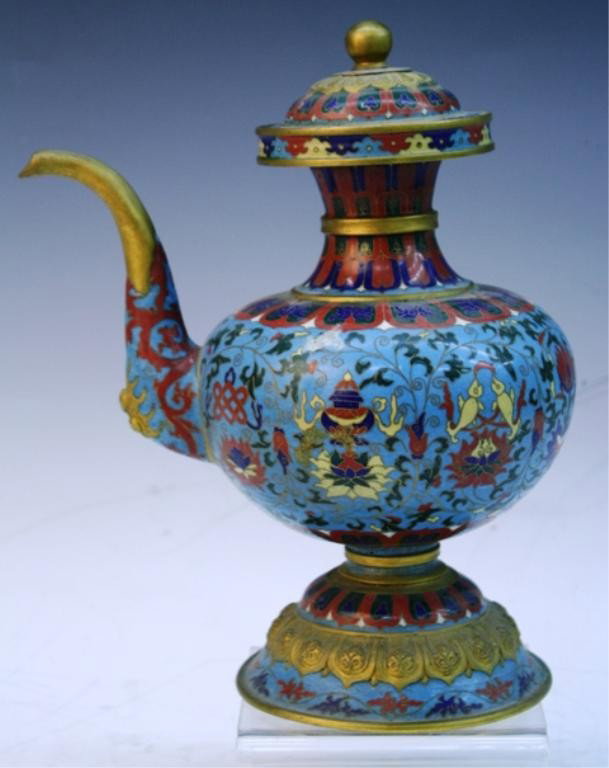 Chinese Cloisonne Teapot w/ Lotus Flowers & Shells: Cloisonne teapot with lotus flowers, fish, and seashells, China; unmarked. Dimensions: 10"H x 8"W