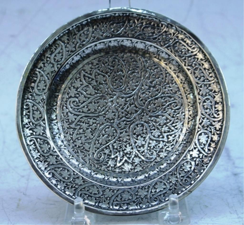Small Persian Silver Plate w/ Leaf/Flower Pattern: Small silver plate with leaf and flower pattern, Persia; marked on bottom. Dimensions: 5-1/4" diameter weight: 3.9 oz