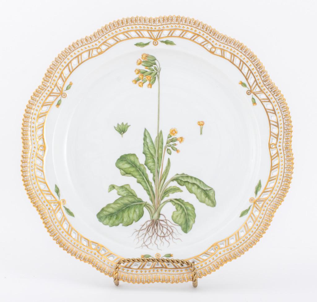 Royal Copenhagen Flora Danica porcelain charger plate hand-painted with cowslip primrose flowers,: Royal Copenhagen Flora Danica porcelain charger plate hand-painted with cowslip primrose flowers, the pierced floriform rim with gilt painted border, inscribed "Primula veris elatior Oed." and marked 