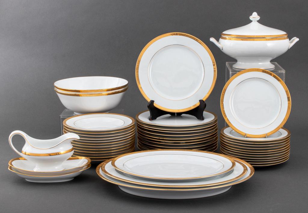 Bernardaud Limoges porcelain partial service in the "Madison" gold pattern comprising twelve (12): Bernardaud Limoges porcelain partial service in the "Madison" gold pattern comprising twelve (12) soup bowls, twelve (12) entree or dinner plates, twelve (12) luncheon plates, three (3) platters, two