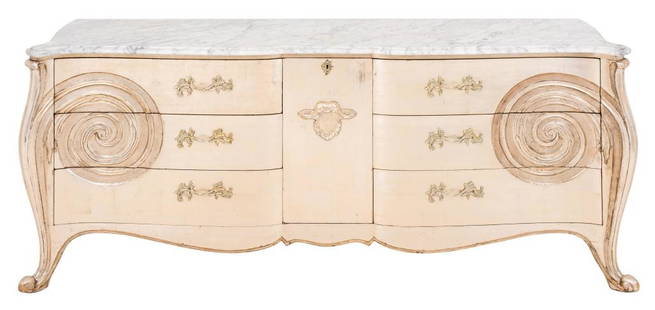 Syrie Maugham (British, 1879-1955) manner Rococo Revival carved and silvered leaf wood curved chest: Syrie Maugham (British, 1879-1955) manner Rococo Revival carved and silvered leaf wood curved chest of drawers, raised on cabriole legs with conforming carrara white marble top, having one central doo