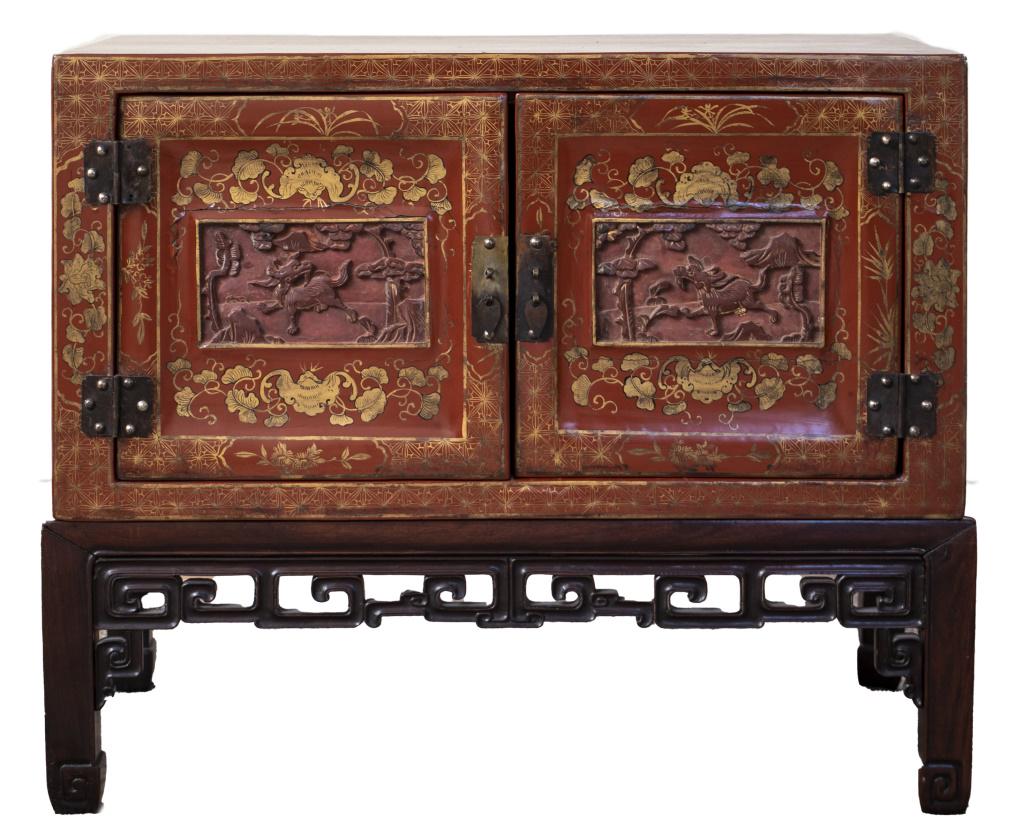 Chinese parcel gilt red lacquer cabinet on stand, the doors centered with carved panels with (1 of 5)
