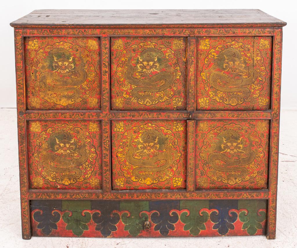 Tibetan monastery painted wood cabinet having four paneled doors with dragon motifs. 44" H x 51.5" W (1 of 9)