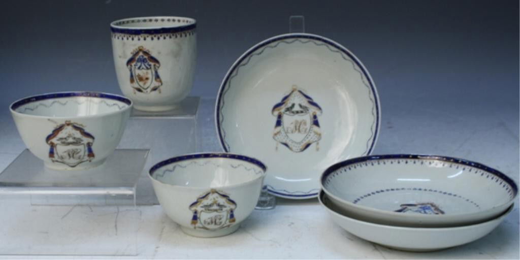 6 pc. Set of Export Chinese Porcelain: Six piece set of export porcelain tea cups and saucers with coat of arms, China; unmarked. Dimensions: smaller cups: 2"H x 3-1/2" diameter; larger cup: 2-3/4"H x 4"W x 2-3/4" diameter; saucers: 1"H x