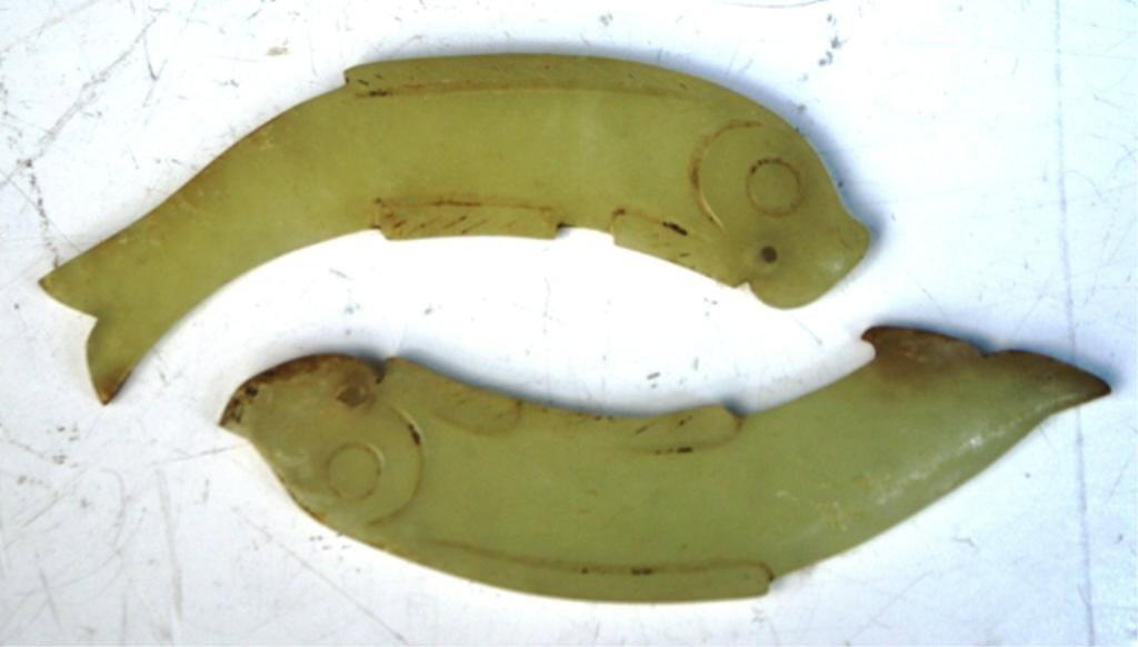 Chinese White Jade Fish Pair Western Zhou Period: Pair of carved yellowish/white jade fish pendants, China, Western Zhou period ( 1110-771 BC); unmarked. Dimensions: each 2-3/4"L x 3/4"W x 1/8"D