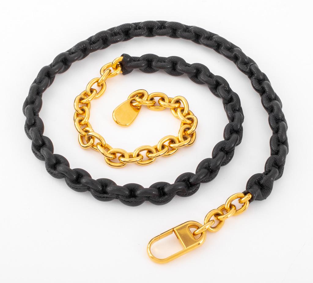 Tom Ford gold-tone metal chain link belt, a large portion covered in black leather, marked "TOM (1 of 5)