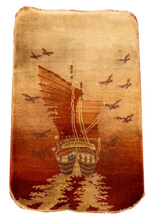 Chinese pictorial carpet depicting a sail ship with a figure and birds flying above. 5' H x 3' W.: Chinese pictorial carpet depicting a sail ship with a figure and birds flying above. 5' H x 3' W.