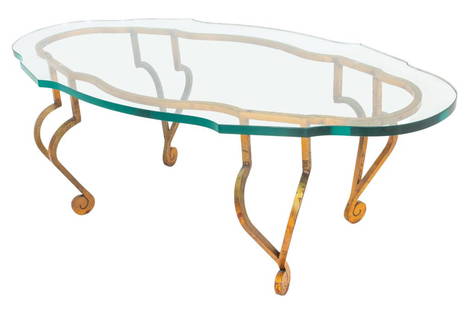 Maison Ramsay Gilded Wrought Iron Low Table: Hollywood Regency gilded wrought iron low coffee or cocktail table, 1950s, the model by Jean Charles Moreux (French, 1889-1956) for Maison Ramsay, with shaped oval top above conforming lacquer-gilded