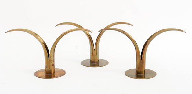 Bjork for Ystad Sweden Lily Brass Candlestick, 3: Ivar Alenius Bjork (Sweden, 1905-1978) for Ystad-Metall set of three Mid-Century style brass lily-Sweden candle holders, each marked to underside. Each: 4.75" H x 8.5" W x 3" D.