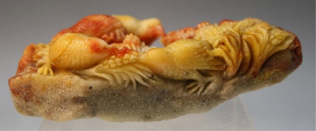 Chinese Soapstone Carving with 5 Chickens: Small carving in reds and yellows with five chickens, soapstone, China; unmarked. Dimensions: approximately 4-1/4"L x 2-1/4"W x 1-1/4"D