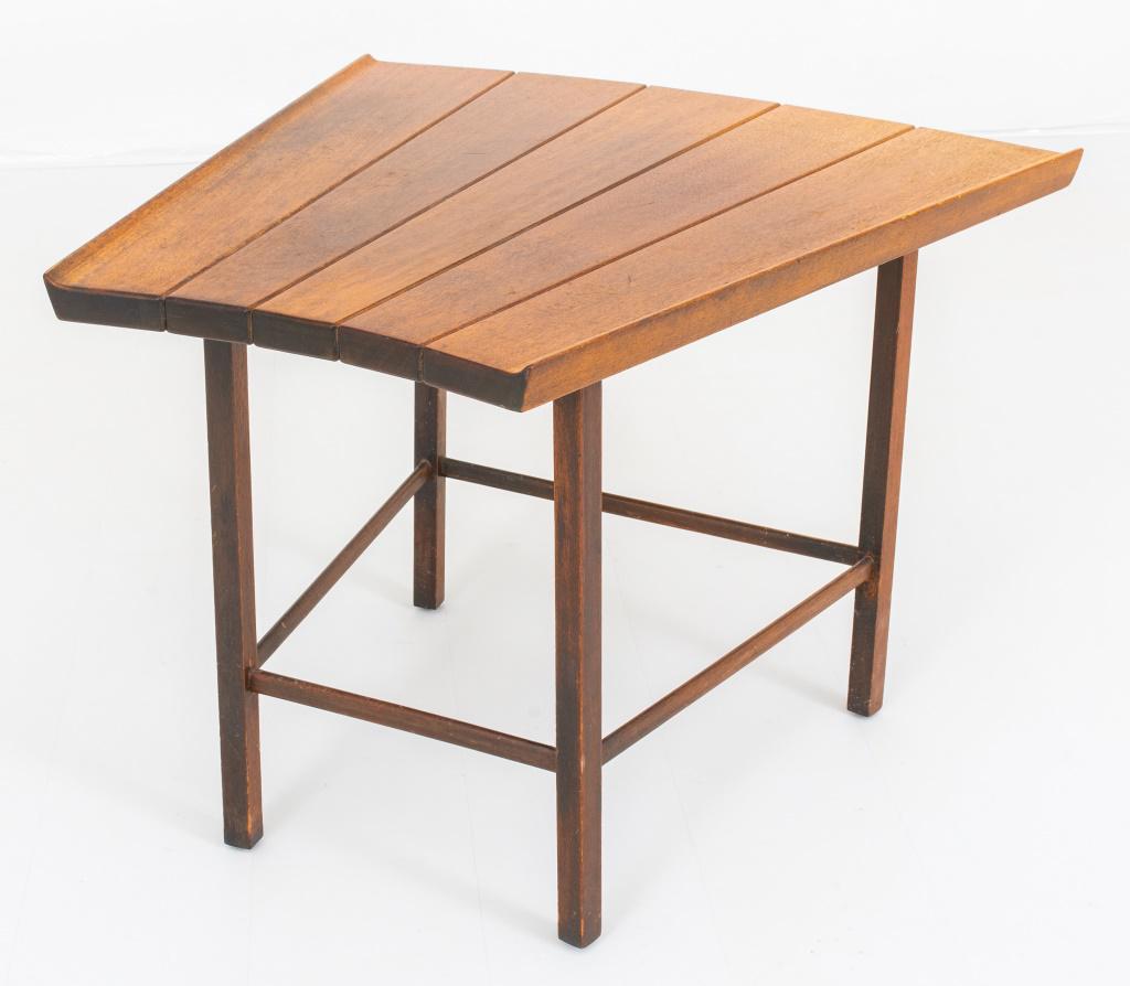 Fan Shaped Teak Occasional Table: Fan shaped teak occasional table, four legs conjoined by stretchers, beneath a joined fan-shaped top. 21" H x 27" L x 28" W (at widest end)