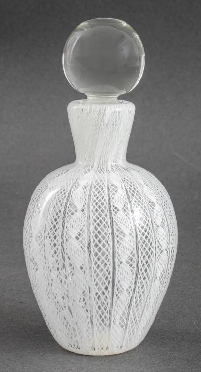 Murano Glass Latticino Perfume Flacon, 1960s: Italian Murano white and colorless "Latticino" glass perfume flacon, circa 1960s, the spherical stopper and wand above an ovoid body wrought in white Latticino glass, original "Made in / Murano / Ital