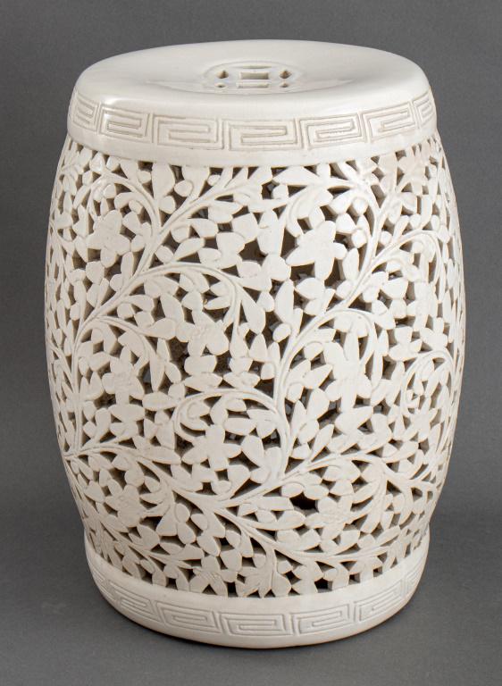 Chinese White Reticulated Ceramic Garden Seat: Chinese white ceramic garden seat, with reticulated floral and foliage motifs, made in Taiwan. 18" H x 11" diameter.