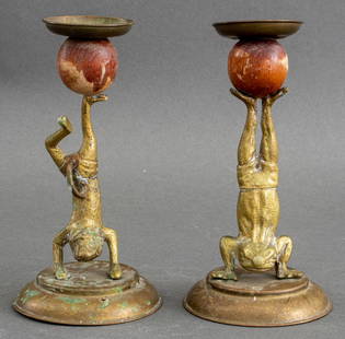 Arthur Court Designs Circus Animal Candlesticks,Pr: Pair of Arthur Court Designs brass candlesticks, in the form of a monkey and a frog holding a wooden ball with their feet, 1977, marked "Arthur Court Designs / Copyrighted 1977" to underside. 6.75" H