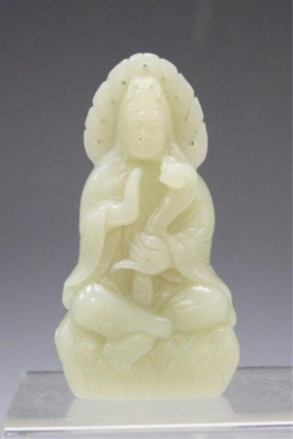 Chinese Jade Carving of Guanyin: Jade carving of a Guanyin holding a ruyi scepter, China; marked. Dimensions: 3-1/2"H x 1-3/4"W x 1/4" D