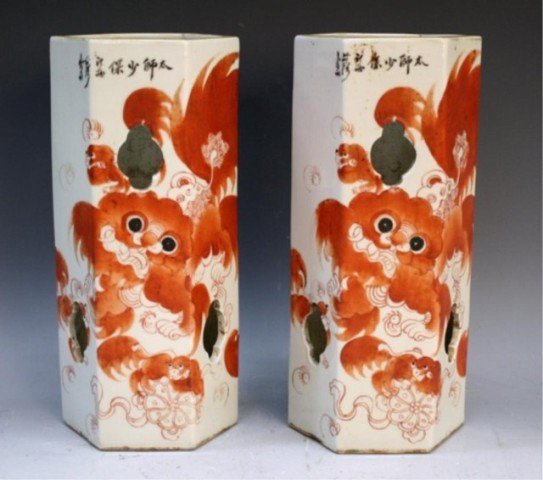 Chinese Pair of Porcelain Hat Stands w/ Foo Dogs: Pair of hexagonal porcelain hat stands decorated with foo dogs, China; marked. Dimensions: each 11-1/4"H x 5-1/4"W x 4-3/8"D
