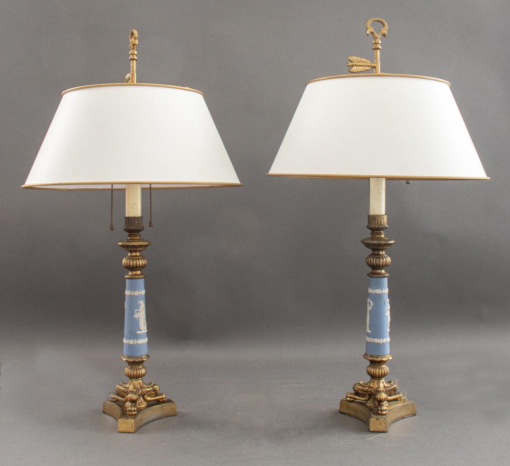 Wedgwood Mounted Restauration Style Lamps. 2: Pair of Wedgwood-mounted Restauration style gilt metal bouillotte lamps, with garlanded blue jasper supports and parchment shades. 26" H x 13" diameter.