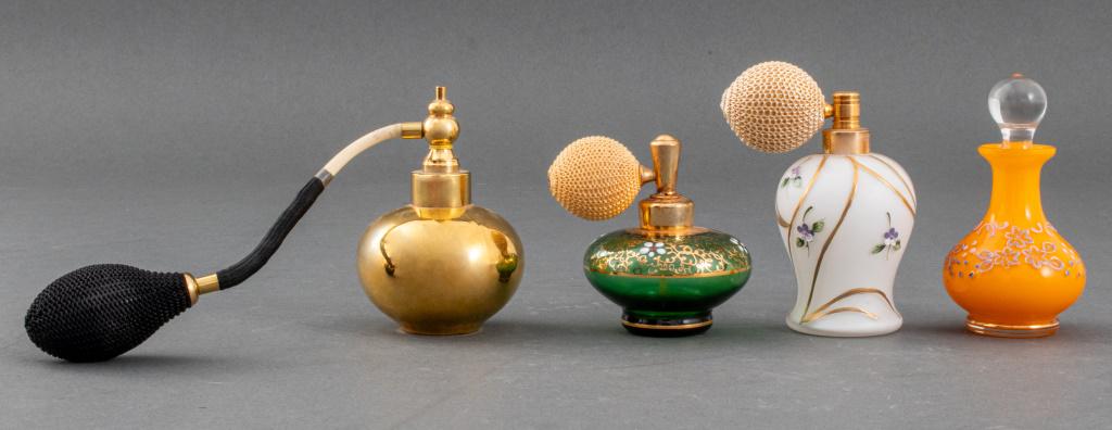 Vintage German Perfume Bottles & Atomizers, 4: Group of four vintage German perfume bottles and atomizers, one Irice frosted over white glass atomizer with gilt and enameled violet flower design, label to underside, one emerald green glass atomize