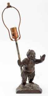 Spelter Sumo Wrestler Figure Table Lamp: Spelter table lamp featuring the sculpture of a Japanese sumo wrestler figure in traditional mawashi attire, with American plug. 16.5" H x 4.5" W x 5.25" D.