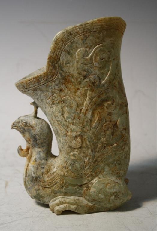 Chinese Carved Jade Pheonix Shaped Vessel Han Dyn.: Carved jade phoenix shaped vessel, China, Han dynasty (206 BC-220 AD); unmarked. Dimensions: 7-1/2"H x 2-3/4"W x 5"D