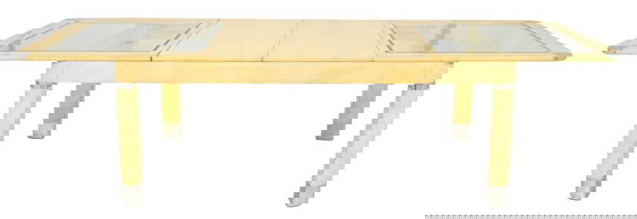 Savino de Muro Modernist Extending Dining Table: Savino de Muro (American, b. 1939) Modernist extending dining table, rectangular with rounded corners, the top and legs with chromed details (one foot cap lacking) against a faux parchment finish, the