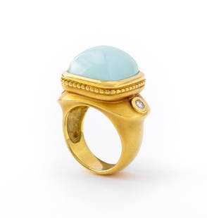 SeidenGang Athena 18K Aquamarine Diamond Ring: SeidenGang Athena ring, fabricated in 18K yellow gold, featuring one aquamarine sugarloaf cabochon weighing approx. 10.00 carats, adorned with two round brilliant cut diamonds weighing a total of appr