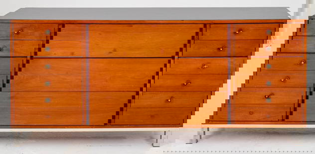 Midcentury Modern Mahogany Dresser: Mid-Century Modern mahogany wood dresser, the rectangular top above three centered long drawers, flanked by five short drawers with patinated metal pulls above a chrome strip and chrome-clad block fee